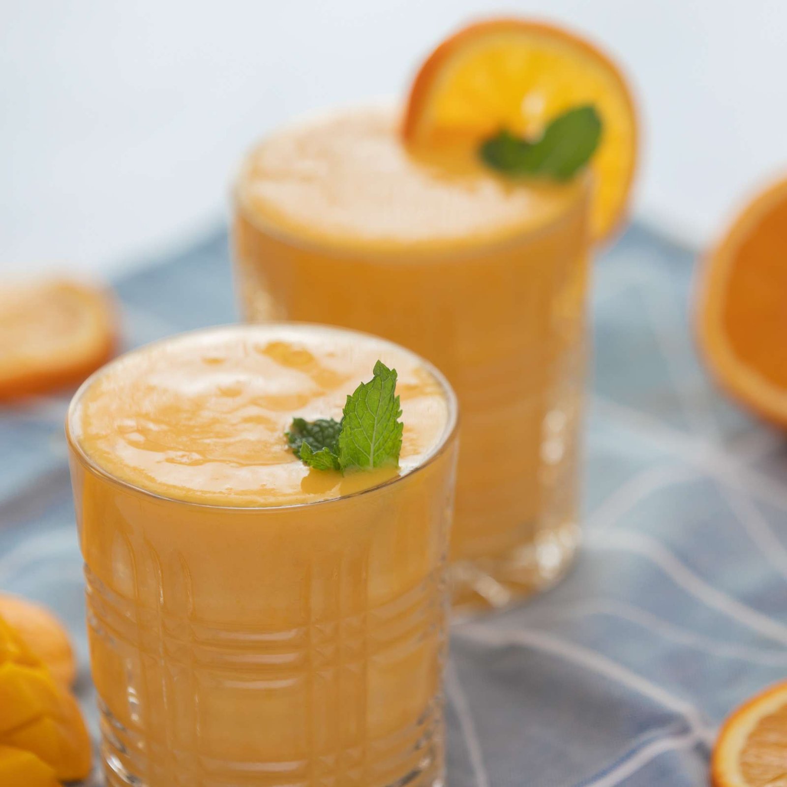 closeup shot of a glass of mango tango juice