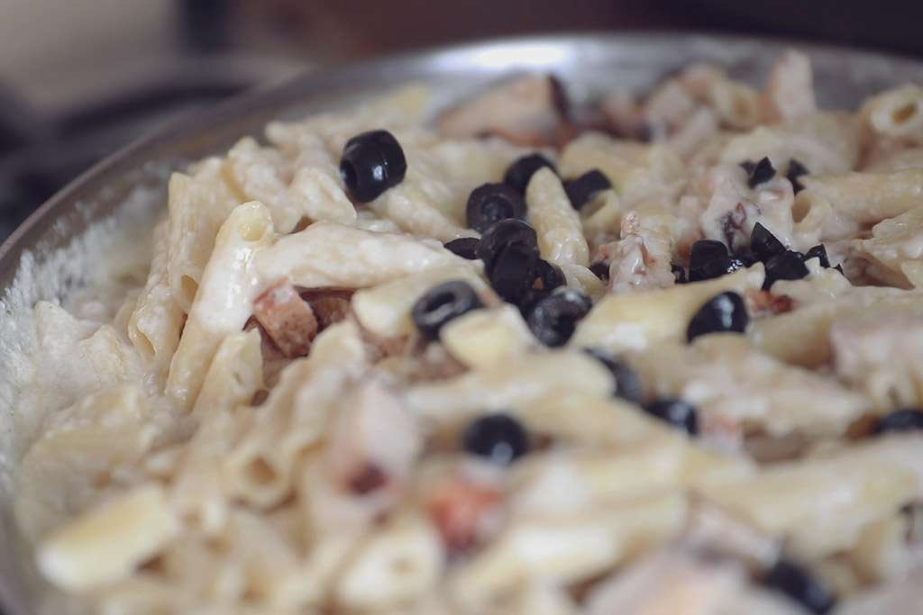 alfredo penne pasta with sliced black olives
