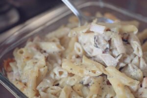 serve alfredo penne pasta in rich cream