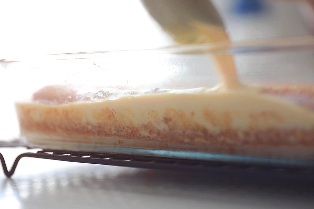pour milk mixture on mexican cake