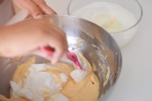 fold egg white to batter