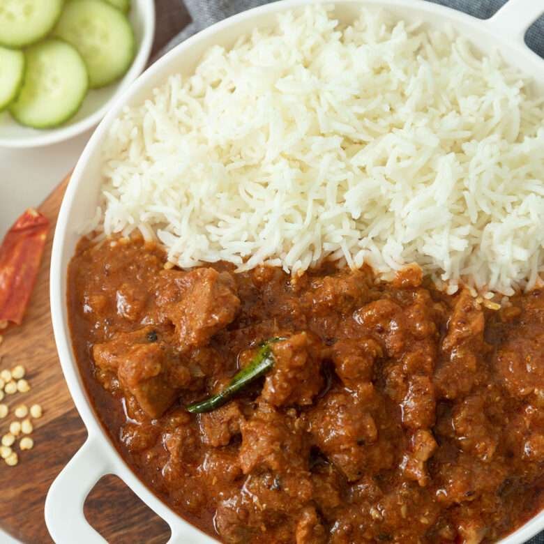 closeup of beef vindaloo spicy with rice