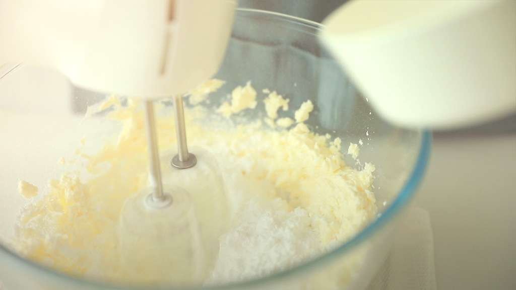 mixing cream cheese and powdered sugar